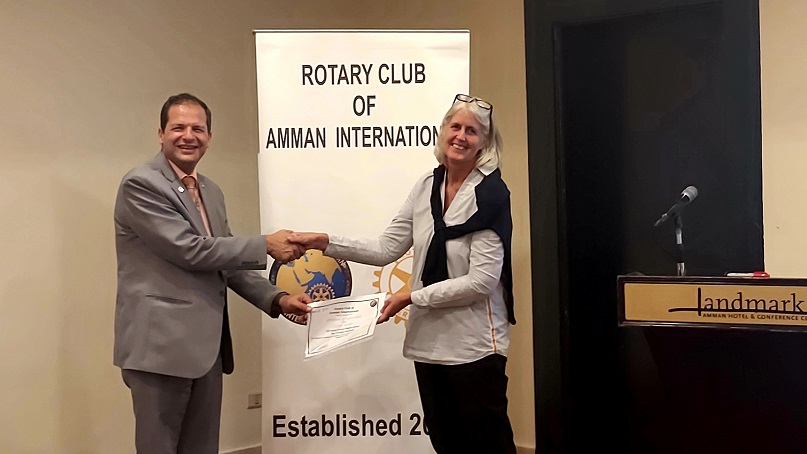President of Amman International Rotary Samuel Kakish honoring speaker with a certification