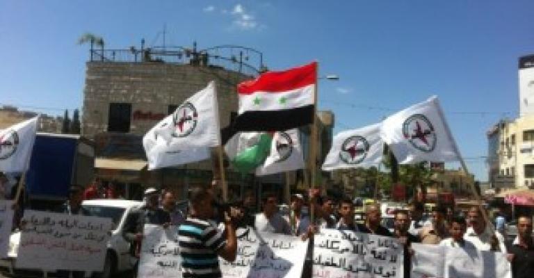 جنين: جبهة النضال الشعبي تنظم وقفة شعبية تضامنا مع الشعب السوري