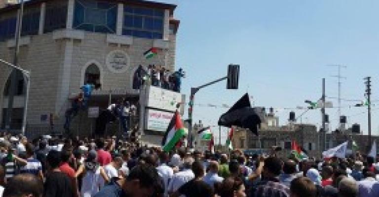 تشييع جثمان الشهيد الطفل ابوخضير تشييع جثمان الشهيد الطفل ابوخضير