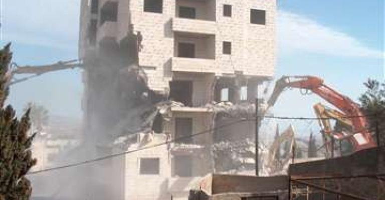 هدم 11 عمارة سكنية في ضاحية الامير حسن (فيديو)
