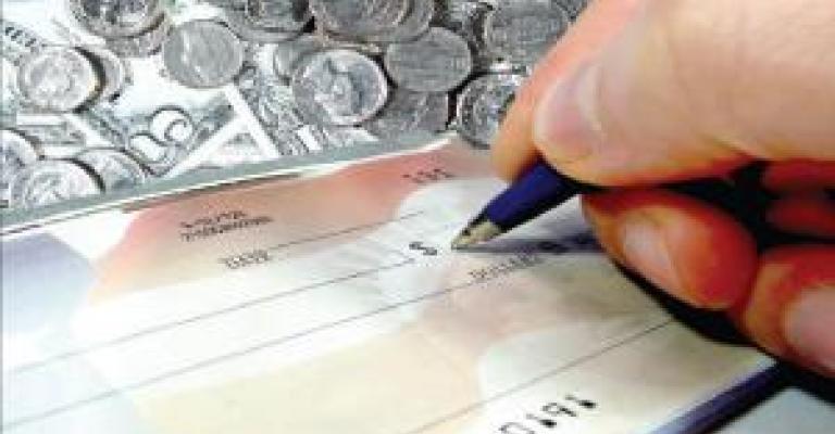 ضبط شيكات مزورة بقيمة ثلاثمائة مليون دينار 