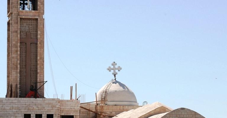 Muslims plant flowers at Behsarah church yard