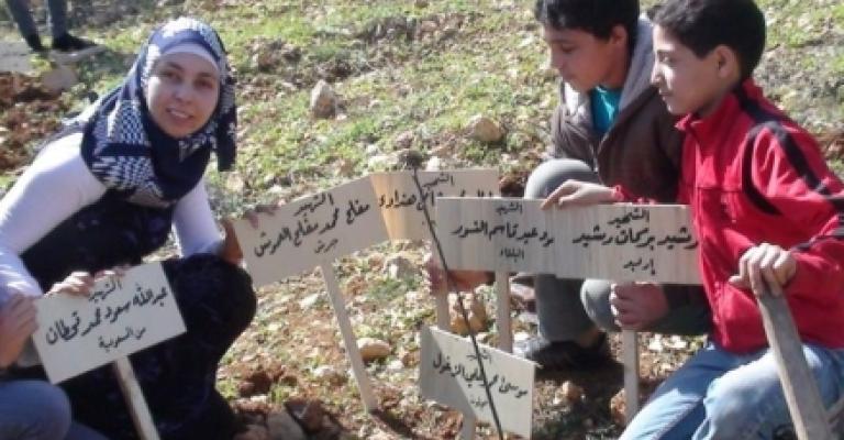 زراعة أشجار تحمل أسماء شهداء الأردن وفلسطين