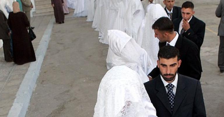 (46) عريساً وعروساً في حفل جماعي الجمعة 