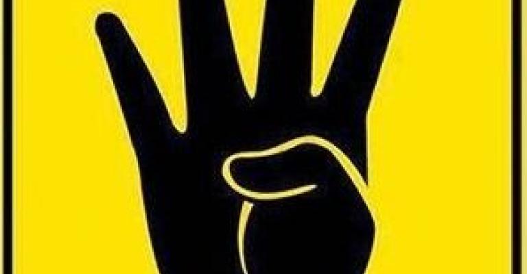 تحويل ثلاثة ناشطين الى أمن الدولة بسبب شعارات "رابعة"