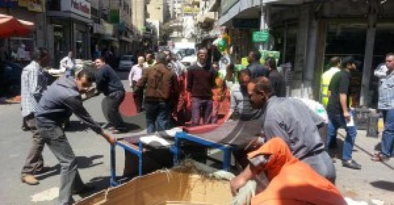 حملة مكثفة لإزالة البسطات مع اقتراب زيارة البابا