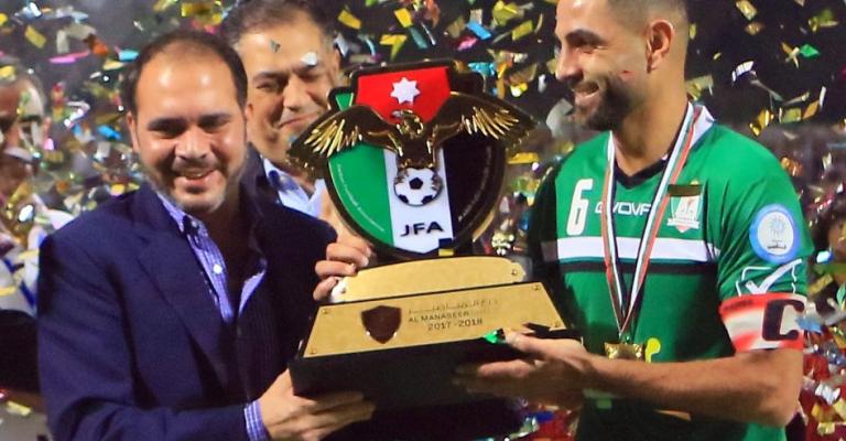 الوحدات يتوج بالدرع