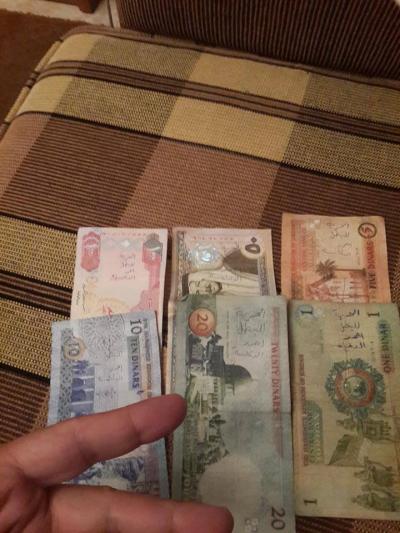 ناشطون يكتبون على الأوراق النقدية تضامناً مع الدقامسة - صور 