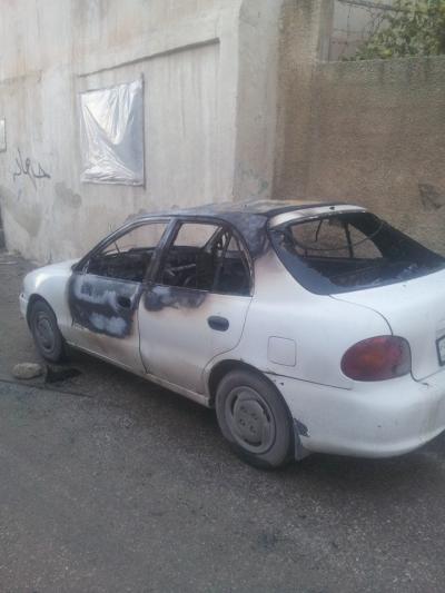 عويس: الداخلية تحقق بحادثة حرق سيارات بمخيم مأدبا