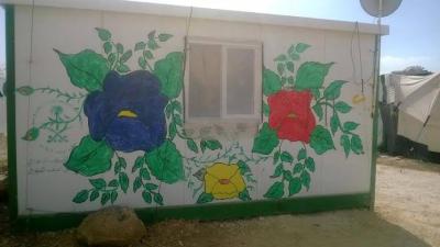 رسومات في أرجاء "الزعتري" تسطّر حكايات اللاجئين