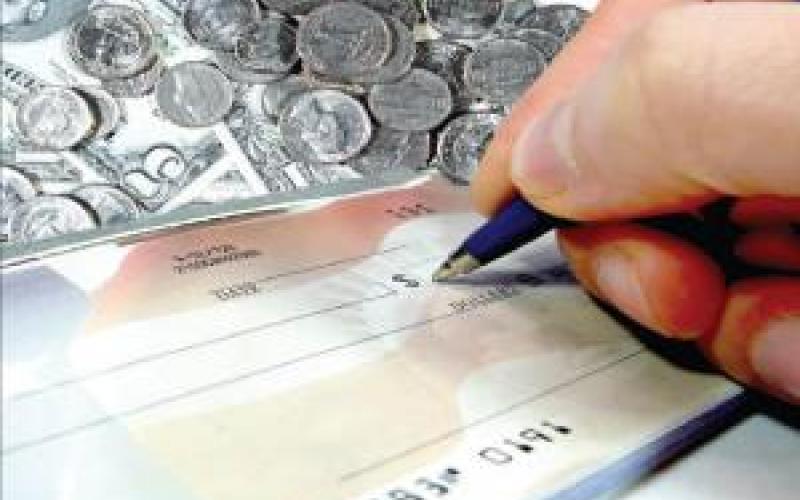 ضبط شيكات مزورة بقيمة ثلاثمائة مليون دينار 