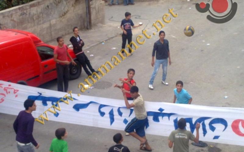 لقطة انتخابية..يافطة مرشح وكرة الطائرة (فيديو)