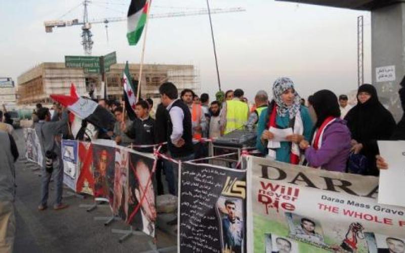 سوريون أمام سفارتهم: بشار بعد القذافي