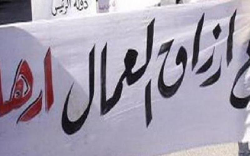 العاملون في الكهرباء يهددون بالتصعيد لعودة عمال مفصولين 