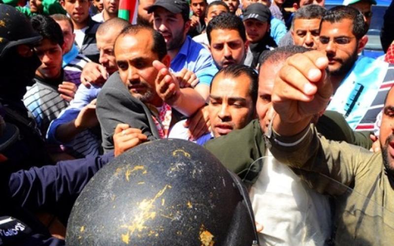 الوطني لحقوق الإنسان: فريق تحقيق بالاعتداء على مسيرة رفض 21