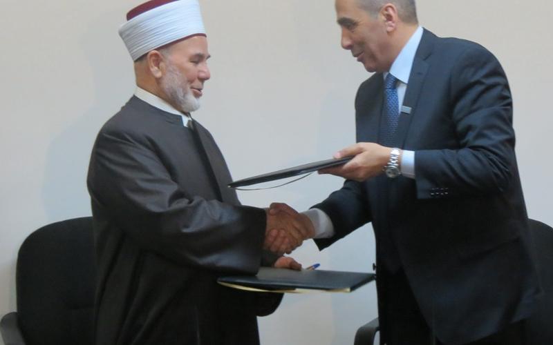 مذكرة تعاون بين دائرة الإفتاء العام والمجلس الوطني لشؤون الأسرة