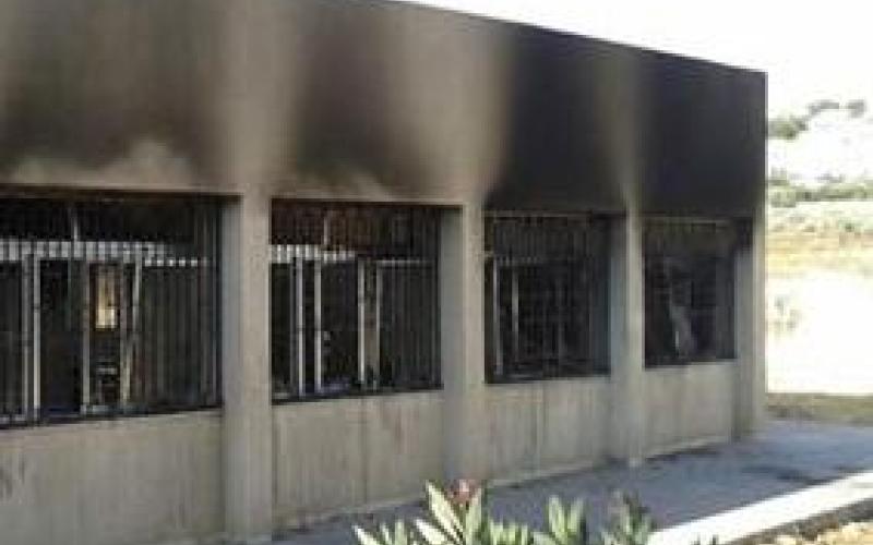 إحراق إدارة المدرسة الصناعية في مادبا