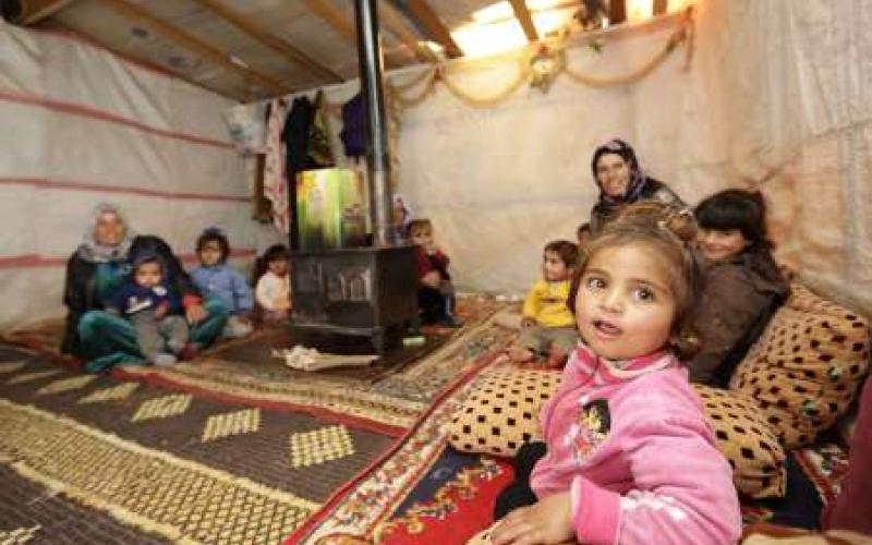 اللاجئون السوريون يجددون أملهم بالعودة مع حلول 2015