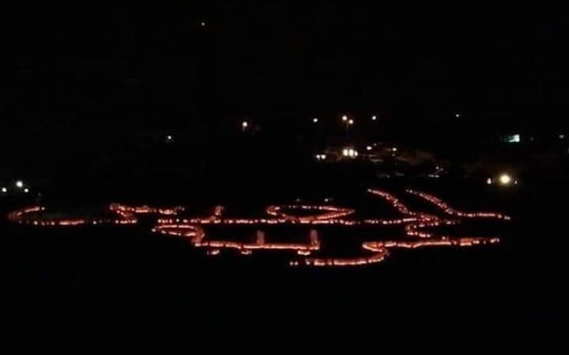 22 الف شمعة تنير جبال السلط "القدس عربية" (صور)